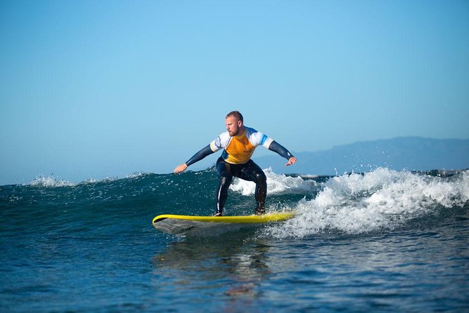 Group Surf Lessons - Beach warm-ups, then time in the water