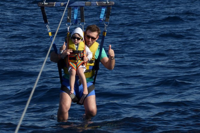 Parascending Tenerife. Stroll above the south Tenerife sea - From life jacket to takeoff