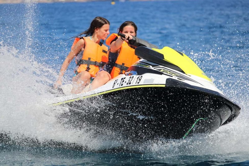 Puerto Colón: Tenerife Coast Jet Ski Tour with Photos - A short speedboat ride before the main event