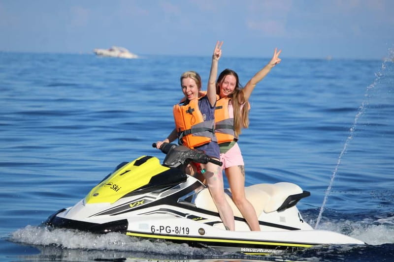 Puerto Colón: Tenerife Coast Jet Ski Tour with Photos - The open-water swim and photo stop