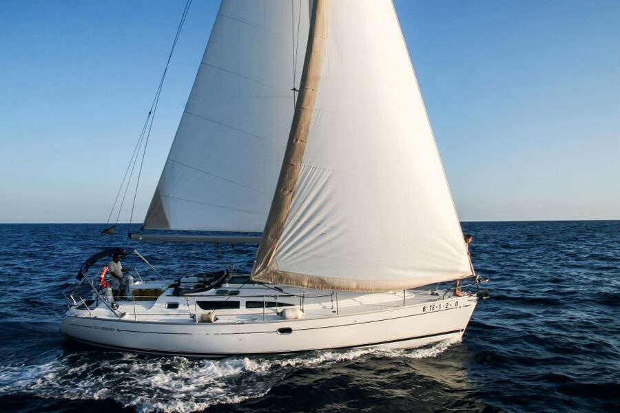 Tenerife: Sailboat Tour with Food and Snorkeling - Sailing the Costa Adeje coast on a small boat