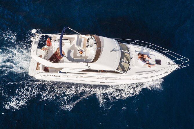 Whales and Dolphins excursion on a Luxury Yacht in Canary Islands - Anchoring near the Los Cristianos cliffs